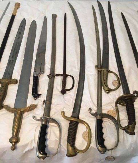 variety of antique swords